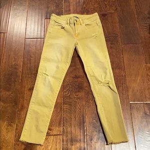 Mustard distressed jeggings